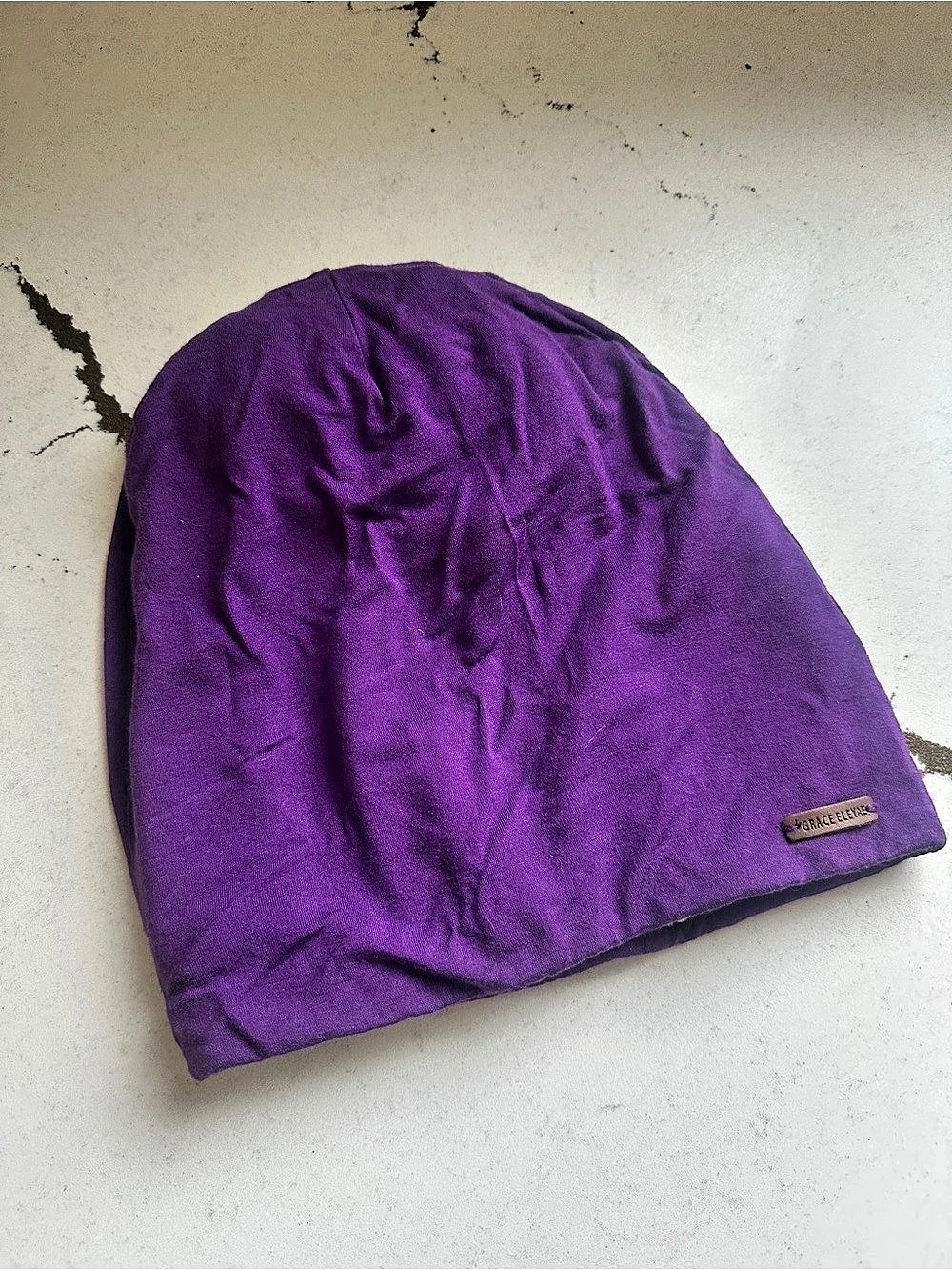 GRACE ELEYAE Purple satin lined adjustable
“Slap” alternative to bonnet